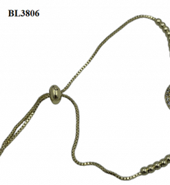 Bracelet- Oval evil eye with gold rhinestones around and small gold beads