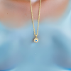 Necklace - Small round evil eye with gold rhinestones around on gold chain