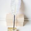 Wedding sign pen in feather decorative base wrapped in burlap and lace