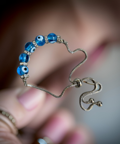 Glass evil eye with rhinestones beads