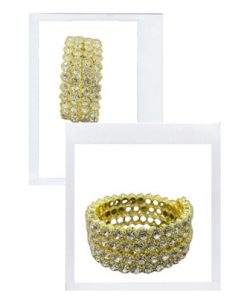 Twisty bangle- 4 rows of large rhinestones with gold outline