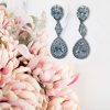 Earring- AAA cubic zirconia tear drop studs with larger hanging tear drops