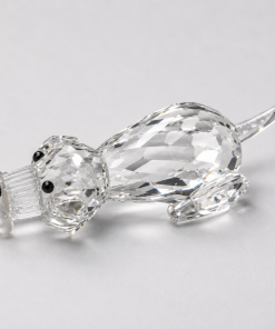 Crystal Figure- Dog lying down with bone in month , ( 0.5" X 2.5" )