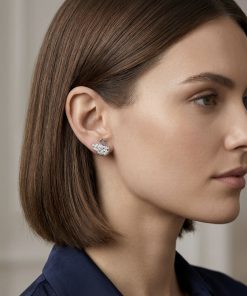 Earring - silver post stud swan cubic zirconia blue eye