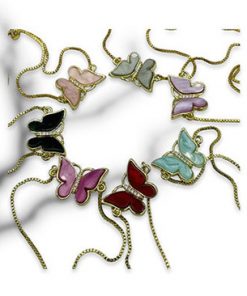 Bracelet- Large butterfly with rhinestone center and gold outline on gold pull cord (colour options)